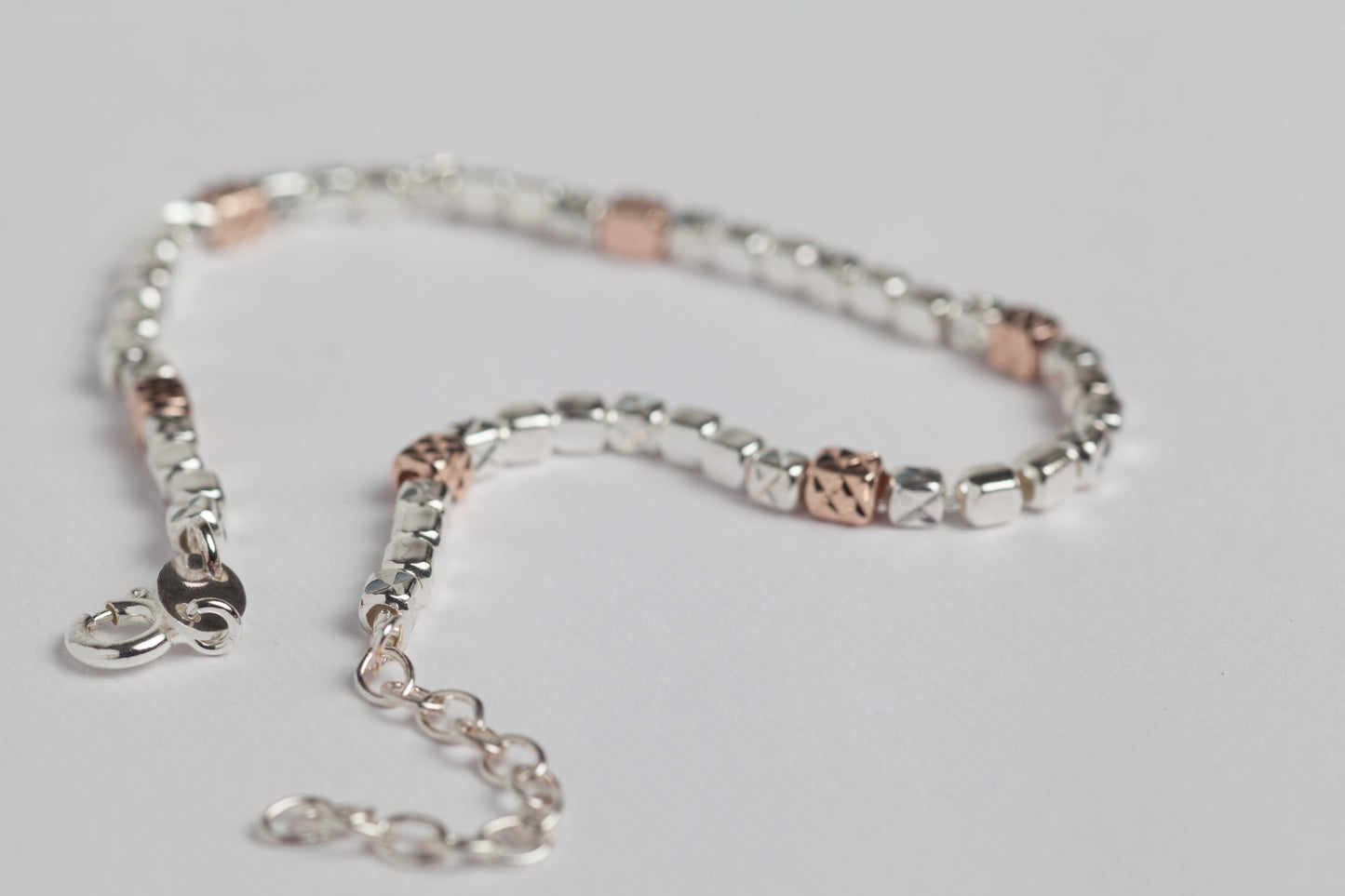 Pepita Bracciale in argento 925 finitura rodiato con elementi placcati oro rosa